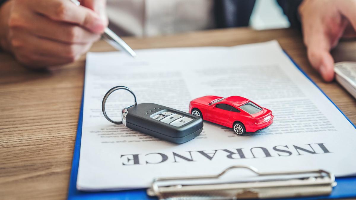Sale agent deal to agreement successful car loan contract with customer and sign agreement contract Insurance car concept.